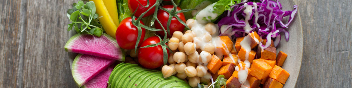 A photo of a colourful vegan salad